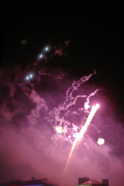 out of focus purple firework explosions