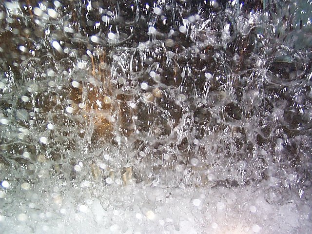 frozen in time, droplets of water in a cascade