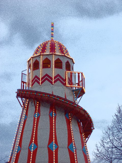 a traveling fairground attraction - grainy photo