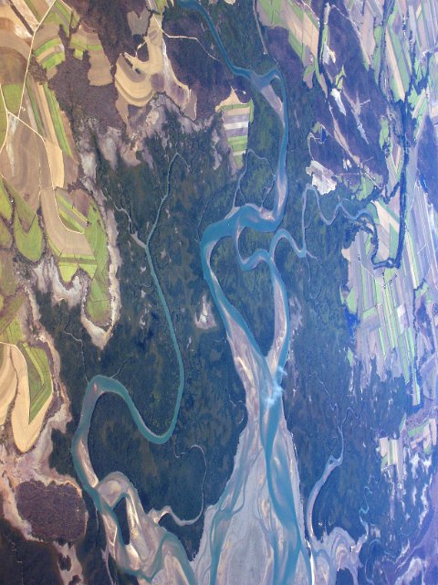 aerial view of a snaking river estury