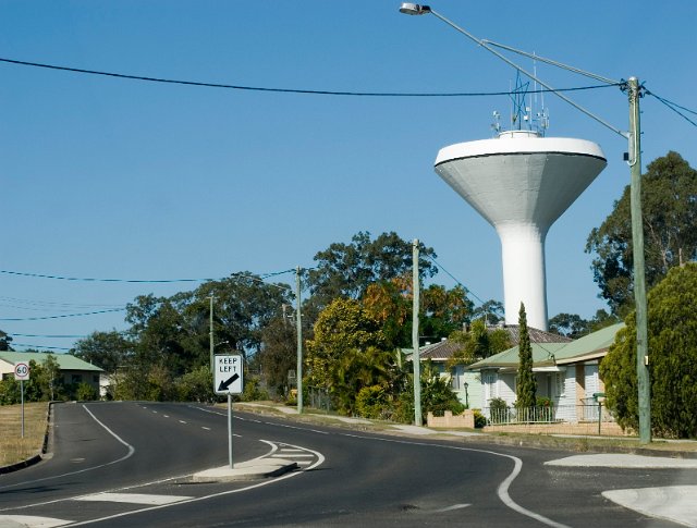 a concrete funnel shaped water tower