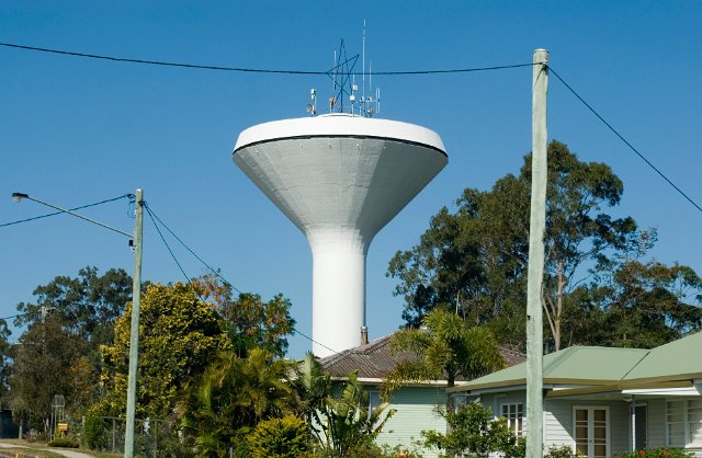 a concrete funnel shaped water tower