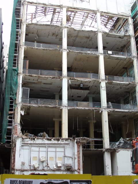 interior of a building during demolition, including the toilets