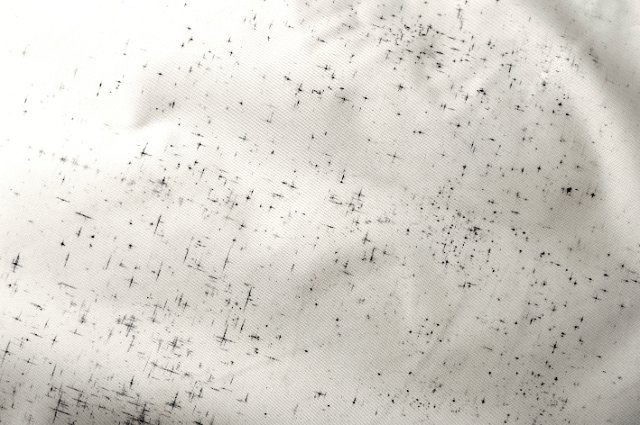 moldy mildew marks on a fabric background