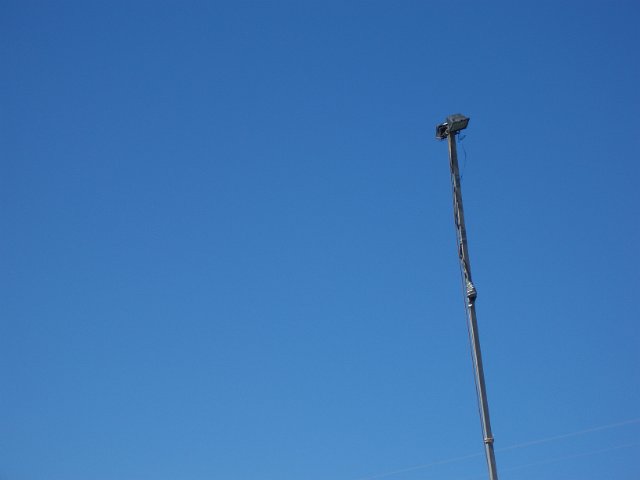 a temporary halogen floodlight on a metal post