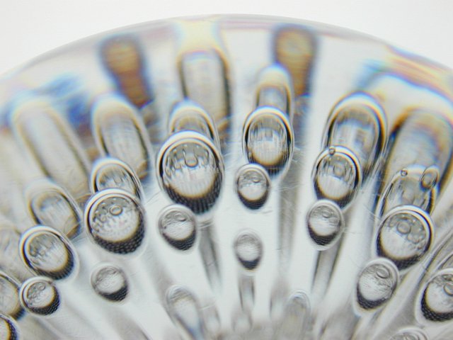 translucent glass paperweight with air bubbles