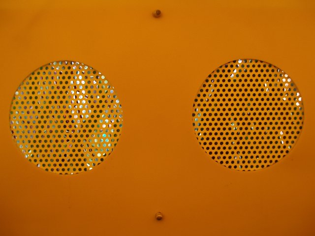 two orange circular air vents