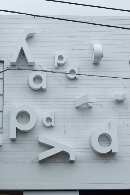 3d charachters on the side of an art shop