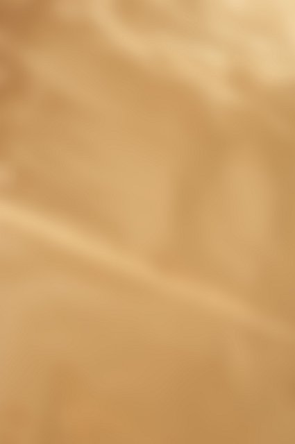 Out of Focus Blurred Close Up of Soft Golden Foil - Abstract Full Frame Background