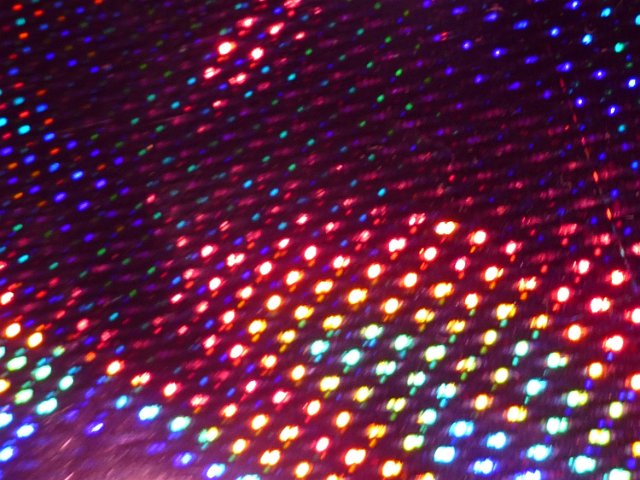 vividly coloured spectrum pattern of bright light spots