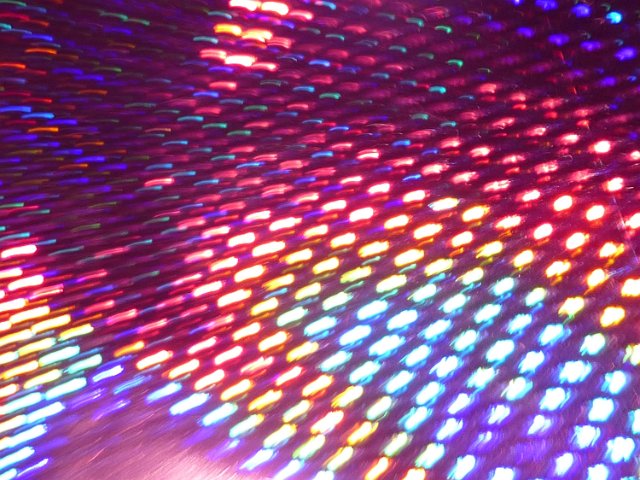 motion blured matrix of colorful lights creating a striking background image