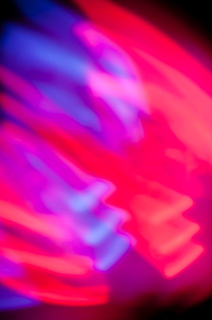 mixing bold colurs of red and blue purple light