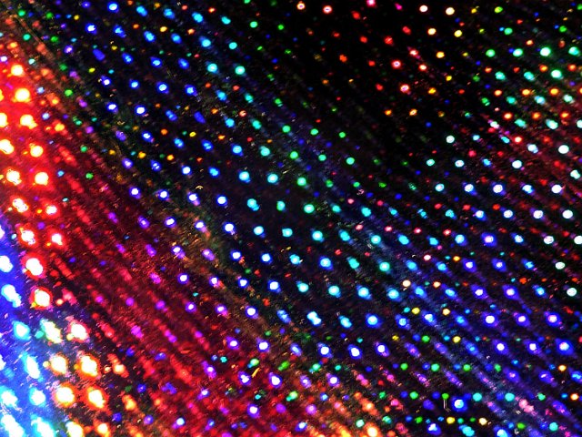 colorful background of multi-coloured highlights on black