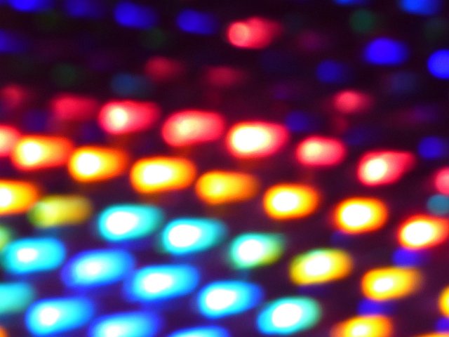 a soft focused background of glowing lights in a grid