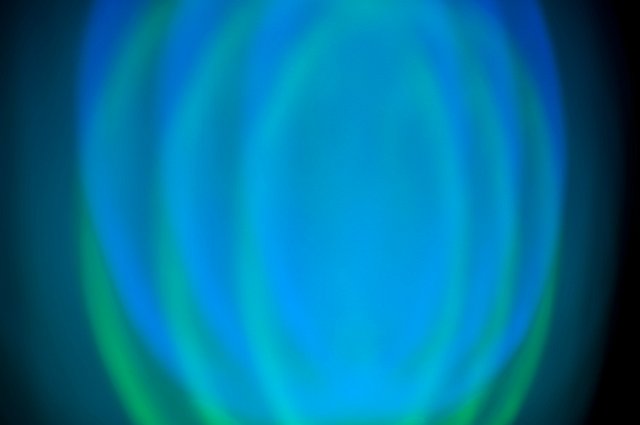 overlappng blue and green light spots