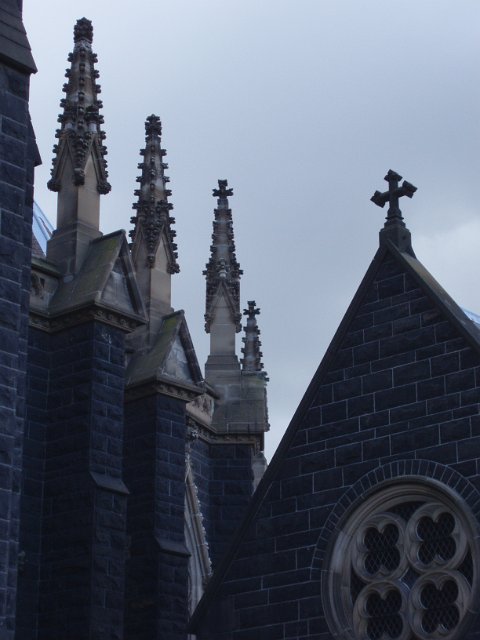 silhouette image of a church roof line
