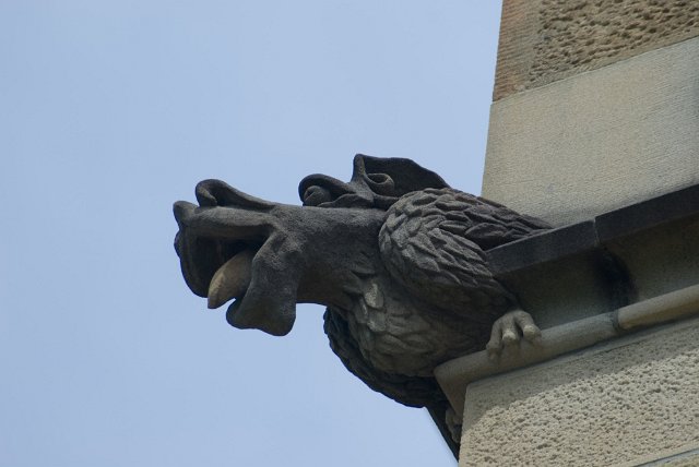 grotesque stone scuplture with tongue sticking out