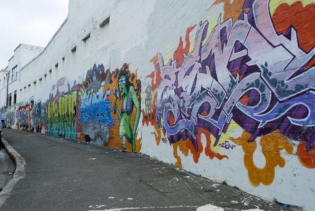 Graffiti artwork on a commercial building wall