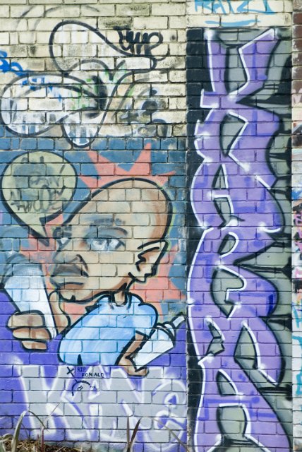 urban art collage, paint on brick wall
