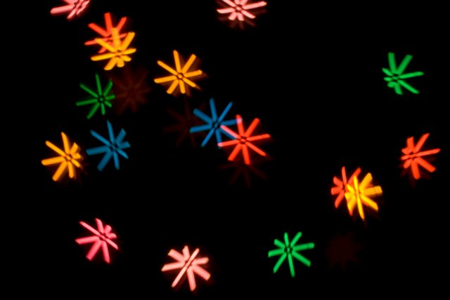 a pattern of colourful bokeh shapes
