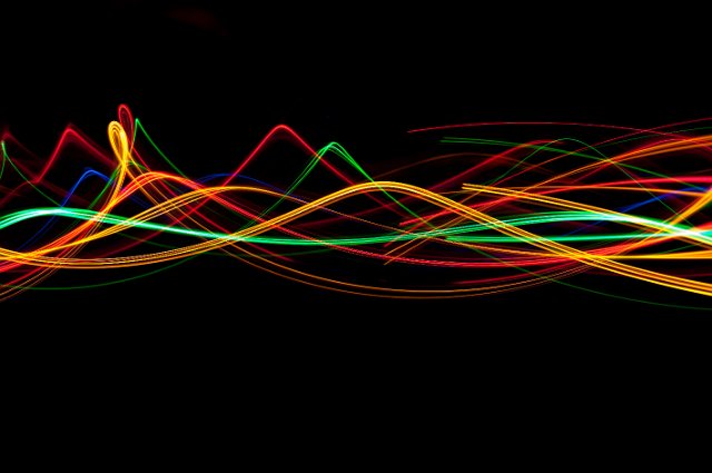 colorful background of curving trails of light