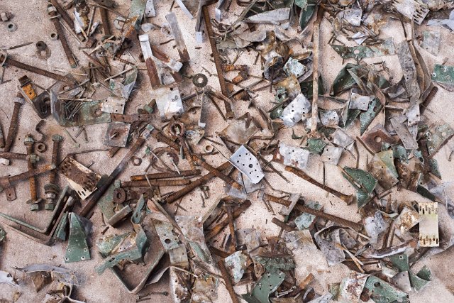 Heap of scrap metal with rusting components in an industrial waste concept viewed full frame