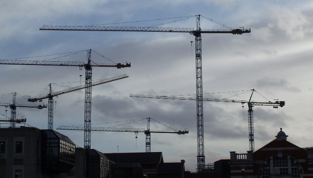 cranes on a large construction site