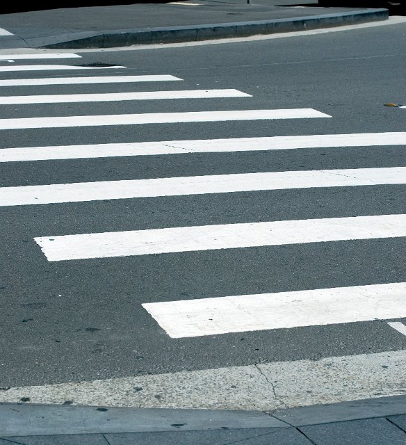 close up on the stripes of a zebra crossing