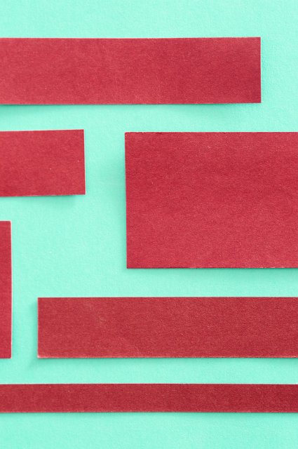 rustic card page layout with red textured boxes on a green background