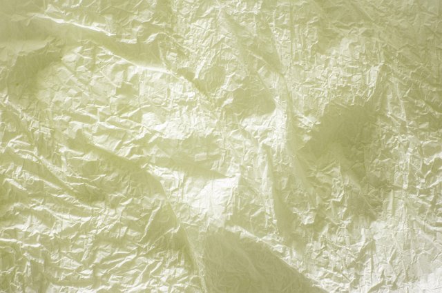crazed background pattern of crumpled and creased tissue paper