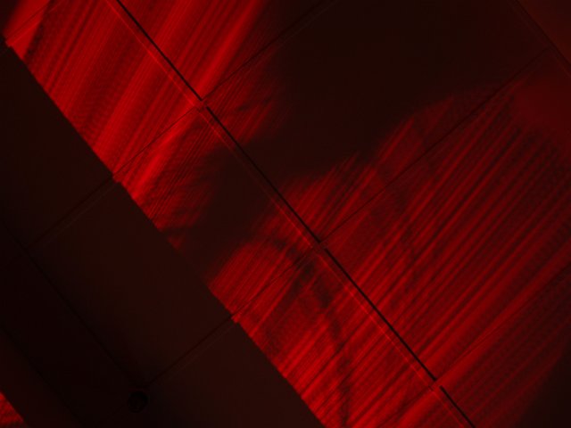 patterns on the ceiling made by a red light