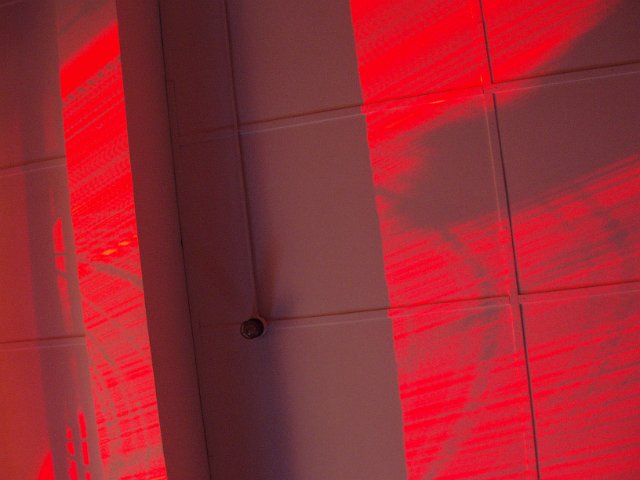patterns on the ceiling made by a red light