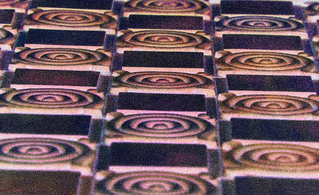 decorative tiles on an old building