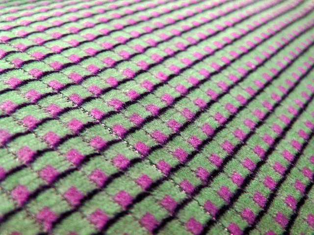 angled view of purple and green squared seat fabric