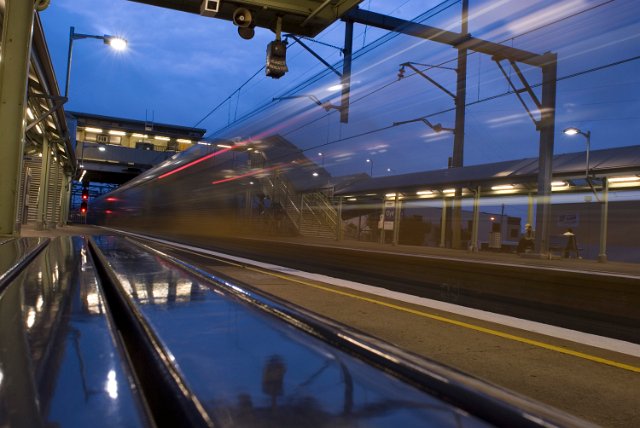railway station train motion blur of a passing train