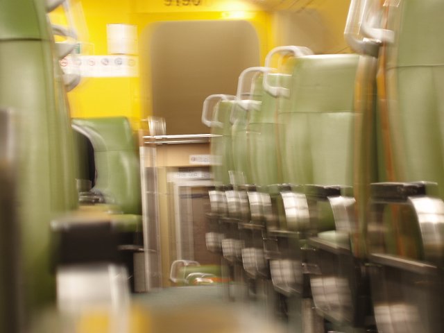 abstract blurred interior of a train passenger car