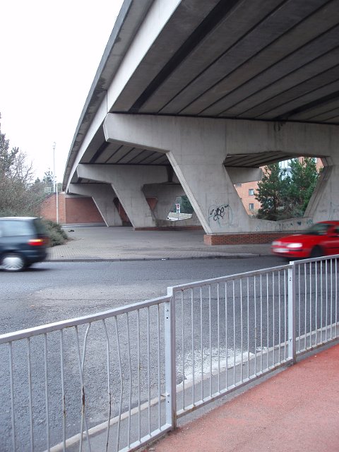 roundabout under the flyover with passing cars