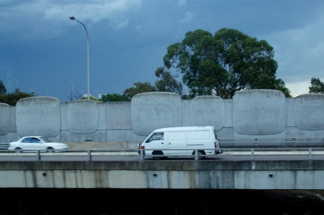 van on the freeway with decorative concrete