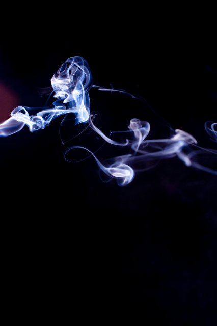 abstract backdrop of twisting smoke