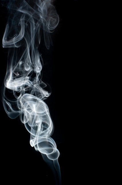 a background of rising swirls or smoke