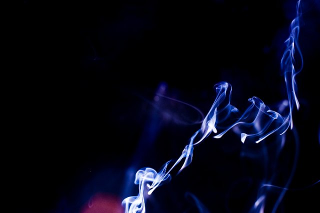 abstract backdrop of blue coloured smoke shapes