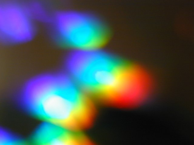 abstract soft focus ethereal image of rainbow coloured lights