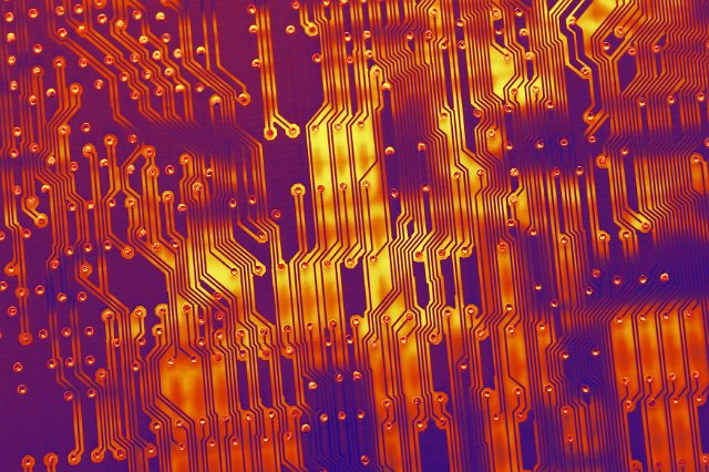 Electronic circuit background concept in infrared colors in close-up and full frame