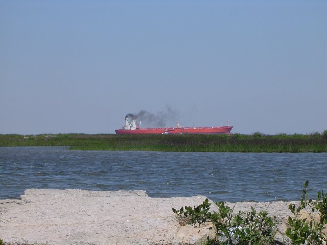 large bulk carrier crossing the horizon