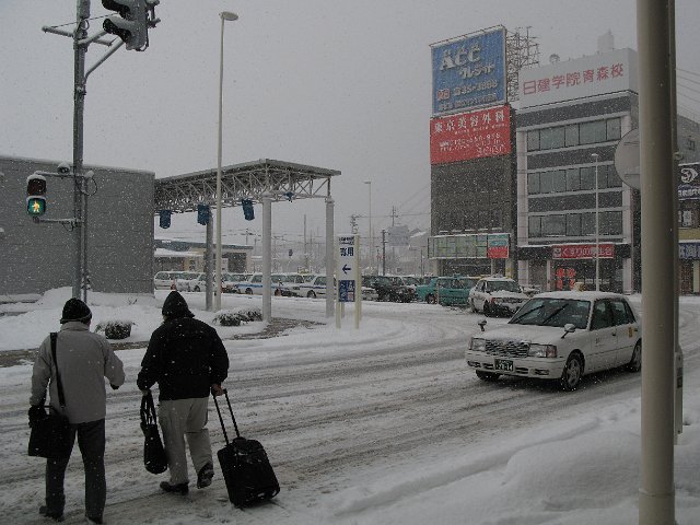 slush on the ground - a snowy day in the city