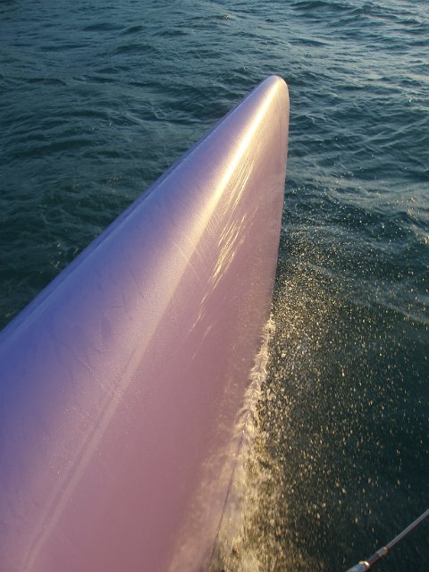 pointed bow of a racing catamaran