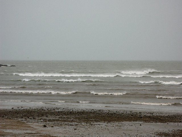 waves during a cyclone, wind blowing off shore