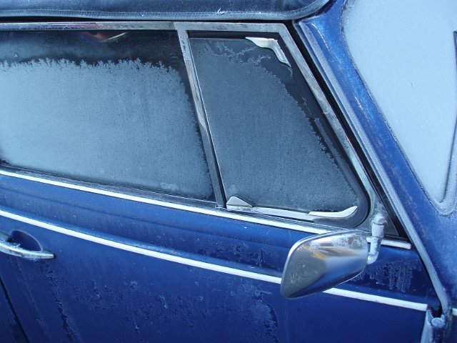frost on side window of a retro car