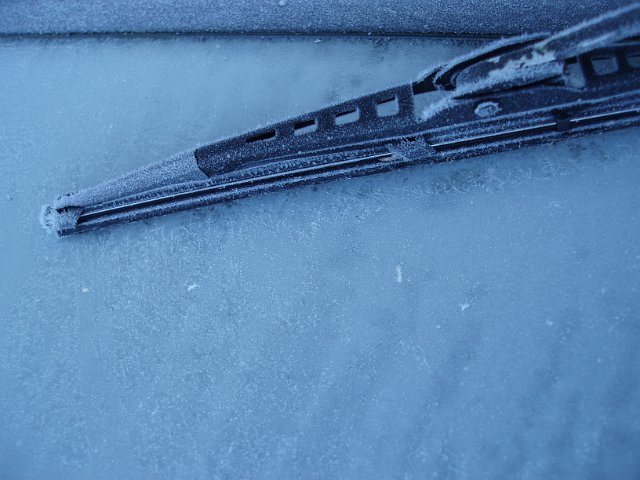 frost on a car windscreen wiper