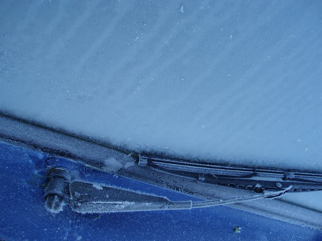 frost on the windscreen of a car